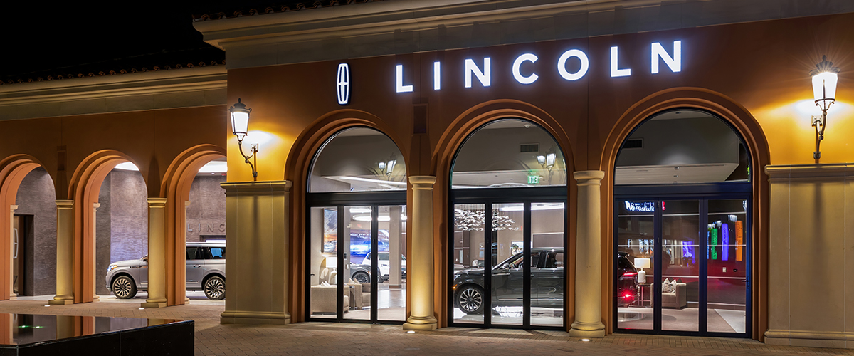 Exterior of the Lincoln Experience Center at Fashion Island in Newport Beach, California at night