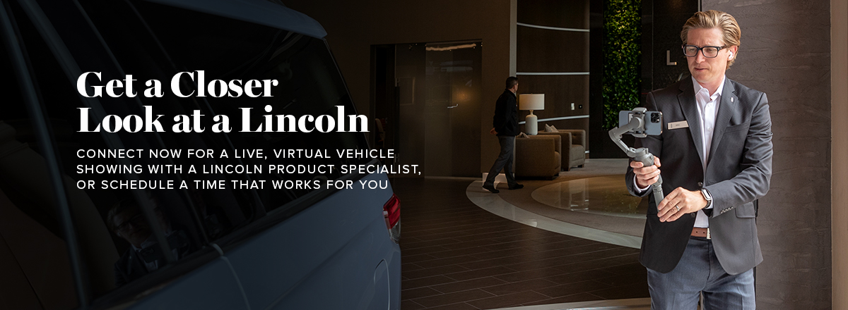 A Lincoln Product Specialist performs a live Lincoln Showcase virtual vehicle tour for a guest.